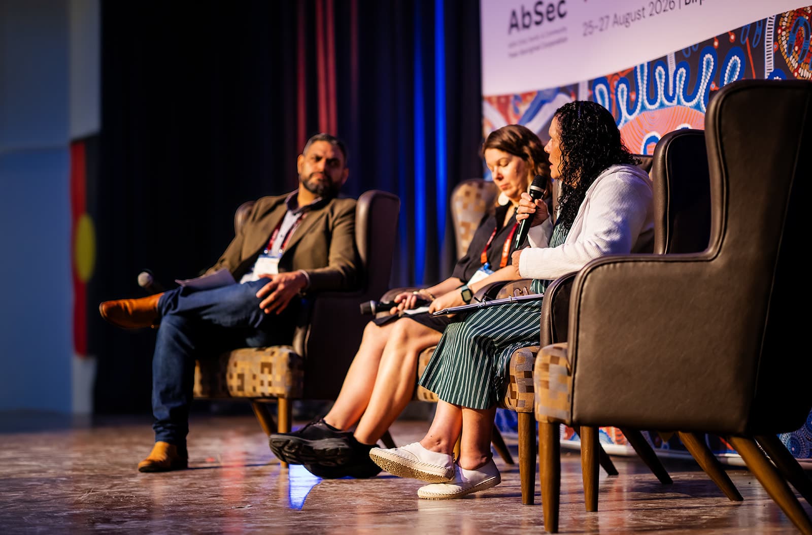 A closer view of panellists listening during a session