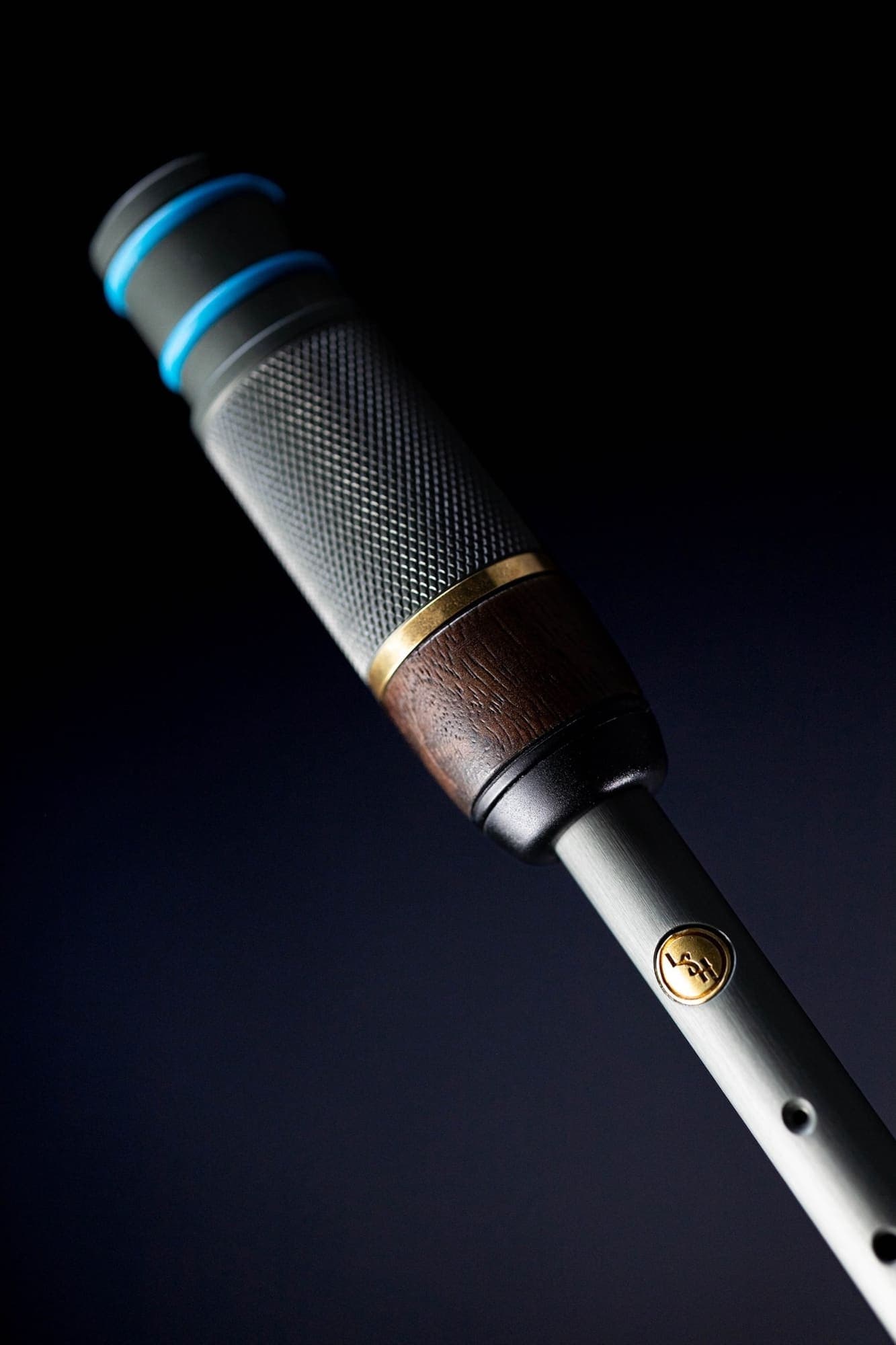 Product shot of a microphone against a dark background