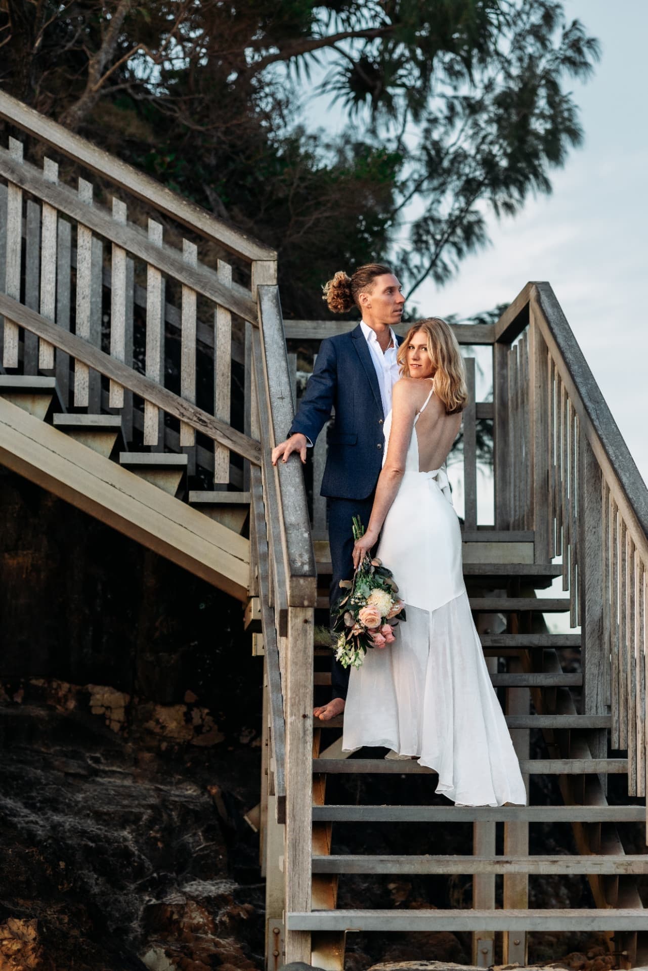 Chloe and JoJo on the timber beach stairs in Port Macquarie