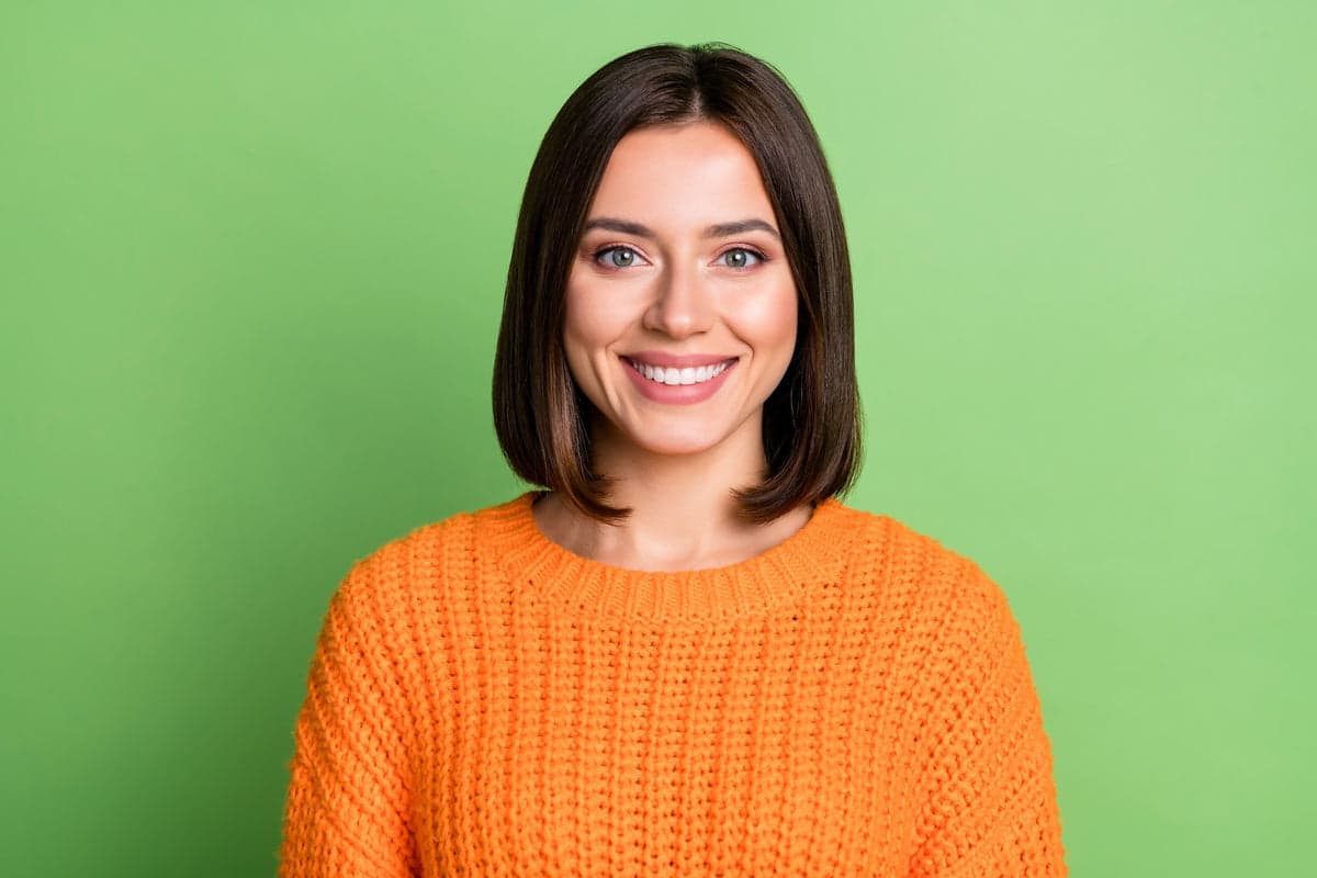 Headshot on a green studio backdrop