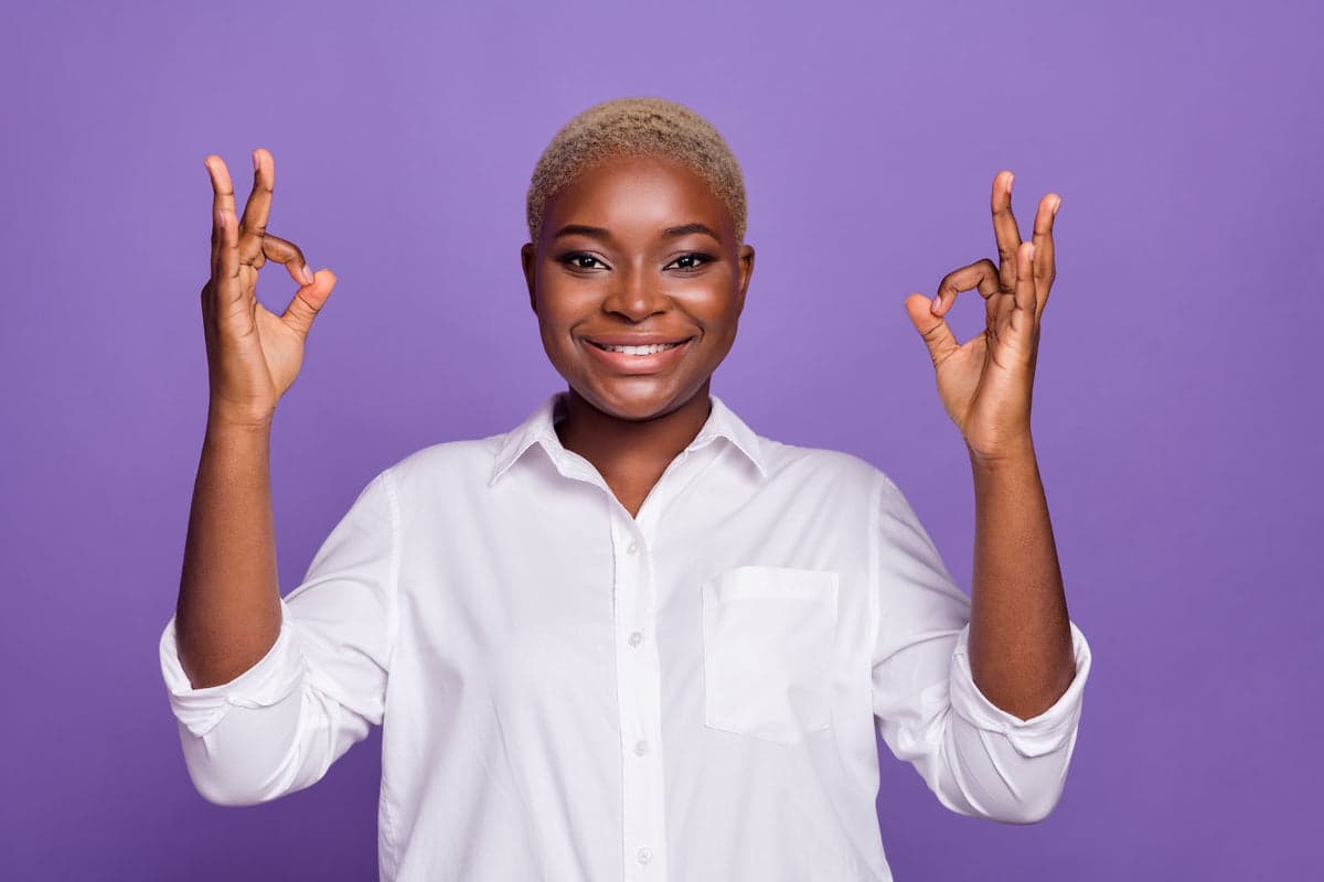 Headshot on a purple studio backdrop