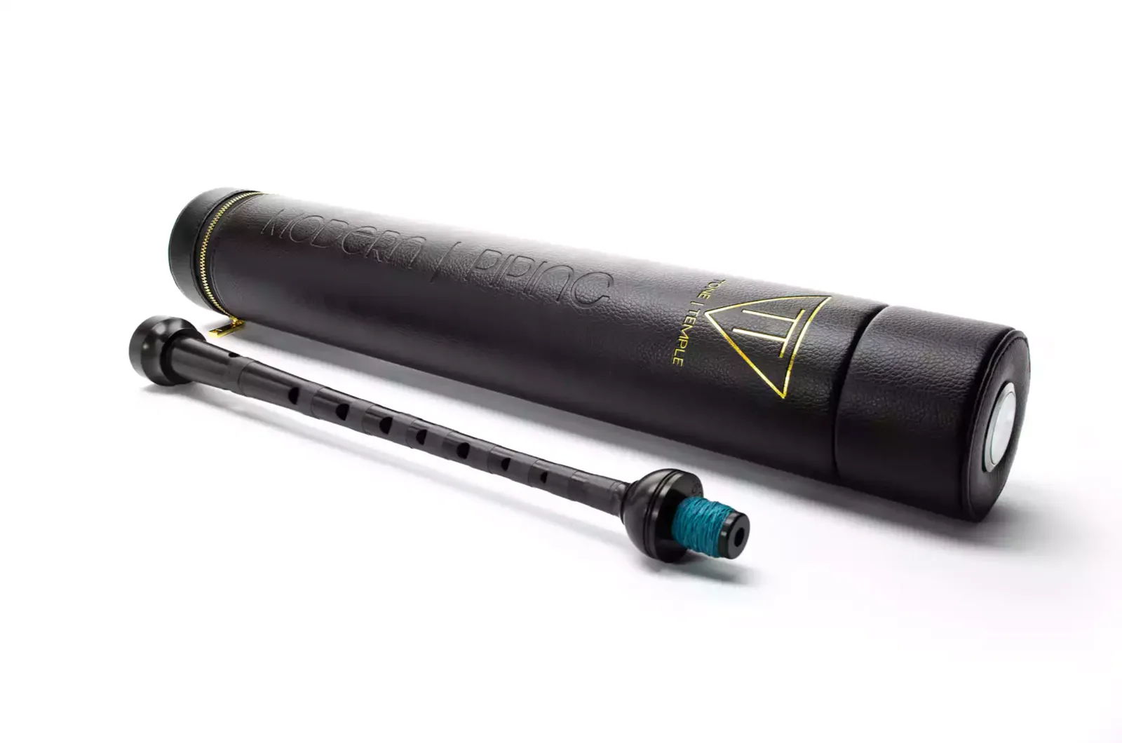 Black tube case and instrument on a white background