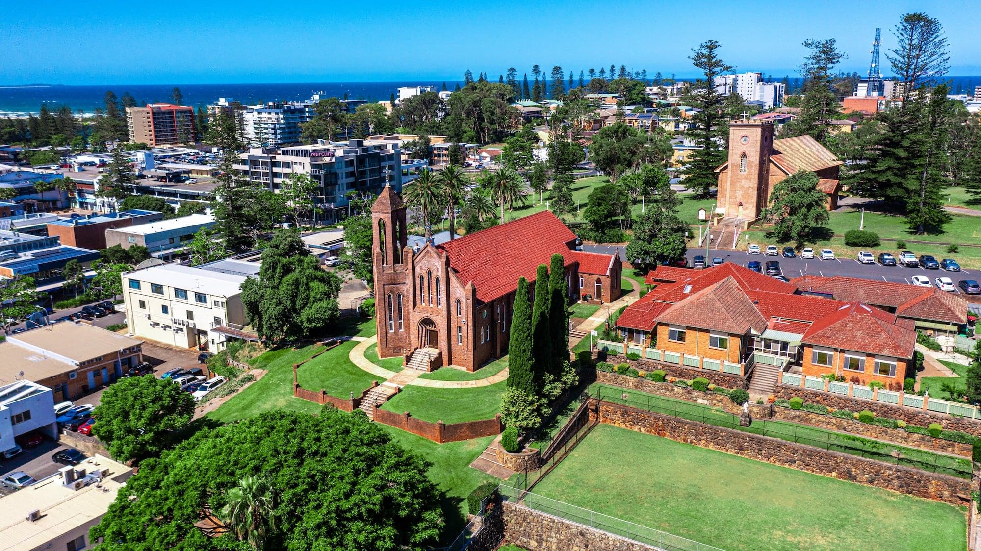 Drone aerial showing a property in its coastal setting